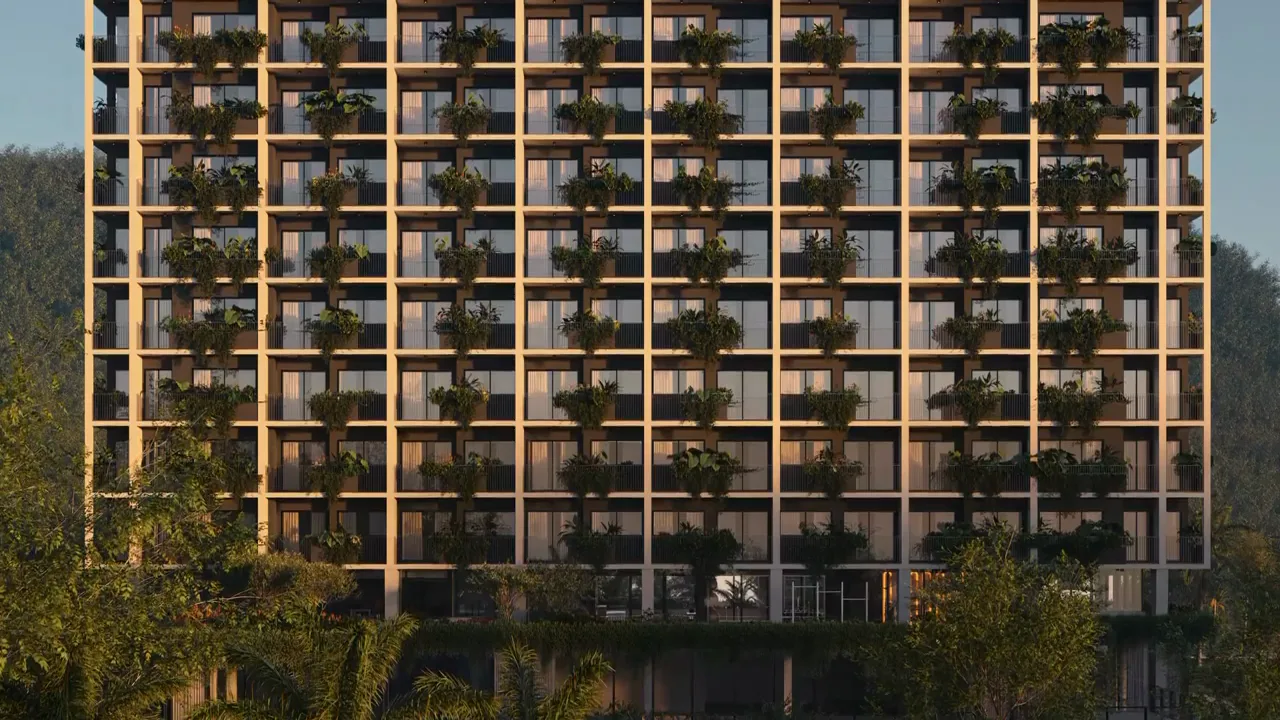 Fachada com jardins do Tenet ao pôr do sol